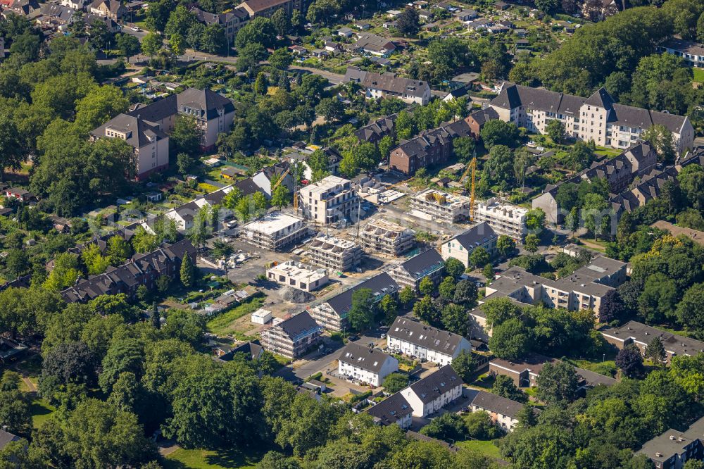 Duisburg from the bird's eye view: Construction site to build a new multi-family residential complex Rueckertstrasse - Halfmannstrasse in the district Obermarxloh in Duisburg at Ruhrgebiet in the state North Rhine-Westphalia, Germany