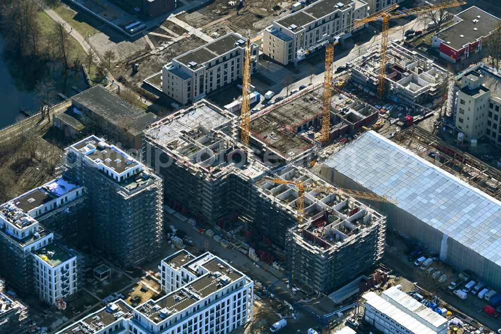 Berlin from the bird's eye view: Construction site to build a new multi-family residential complex on street Carossastrasse - Am Maselakepar in the district Spandau Hakenfelde in Berlin, Germany