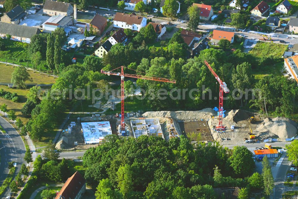 Berlin from above - Construction site to build a new multi-family residential complex on street Am Eidechsenweg - Brunsbuetteler Damm in the district Staaken in Berlin, Germany