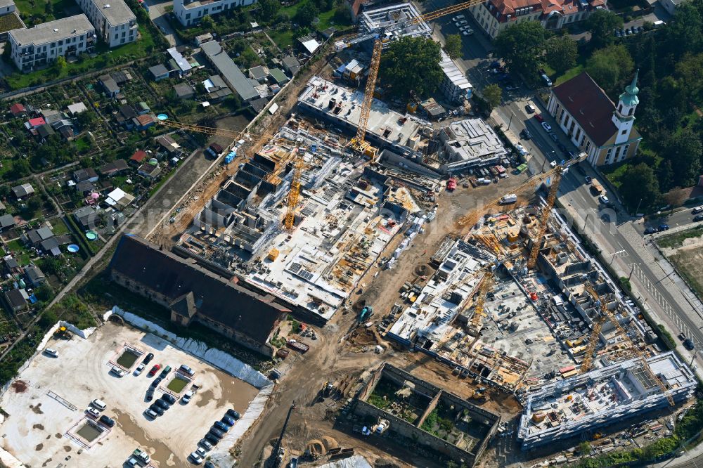 Dresden from the bird's eye view: Construction site to build a new multi-family residential complex Ostravorwerk on street Friedrichstrasse - Vorwerkstrasse in the district Friedrichstadt in Dresden in the state Saxony, Germany