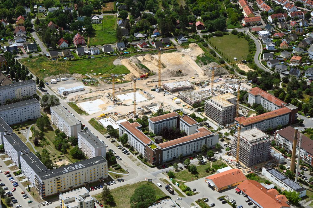 Aerial image Falkensee - Construction site to build a new multi-family residential complex Schwarzbrunner Strasse - Rotkehlchenstrasse on street Falkenstrasse in Falkensee in the state Brandenburg, Germany