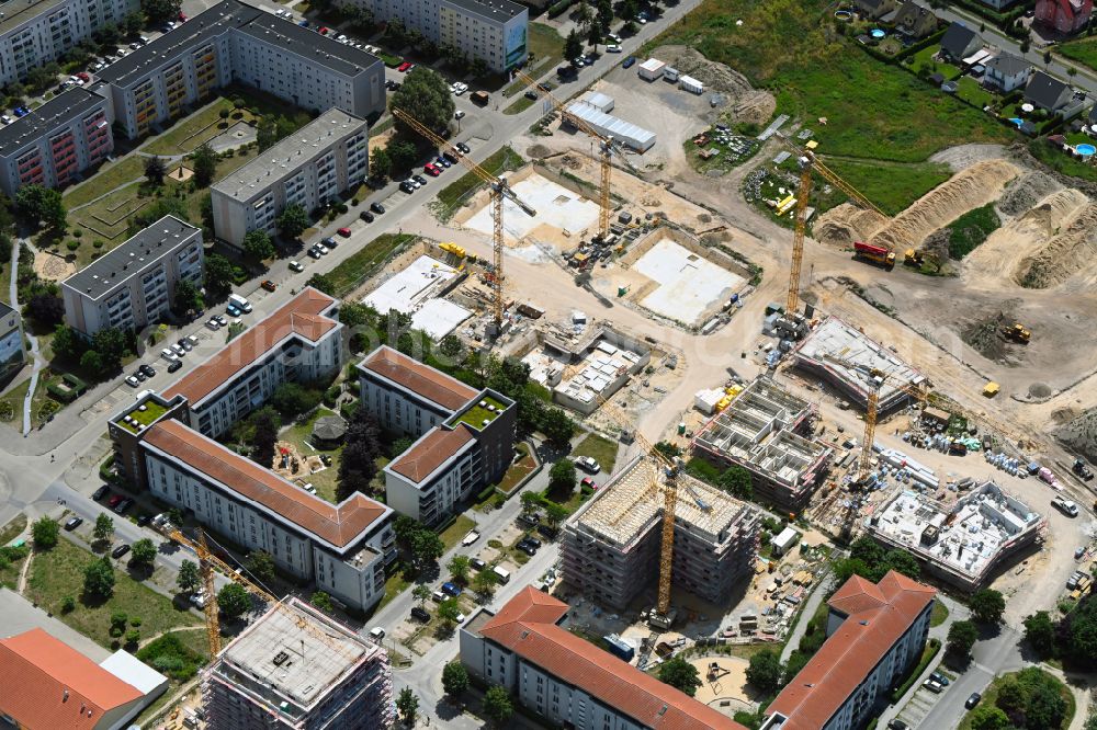 Aerial photograph Falkensee - Construction site to build a new multi-family residential complex Schwarzbrunner Strasse - Rotkehlchenstrasse on street Falkenstrasse in Falkensee in the state Brandenburg, Germany