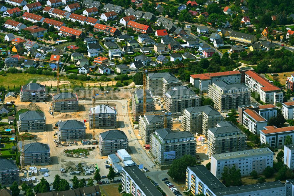 Aerial image Falkensee - Construction site to build a new multi-family residential complex Schwarzbrunner Strasse - Rotkehlchenstrasse on street Falkenstrasse in Falkensee in the state Brandenburg, Germany