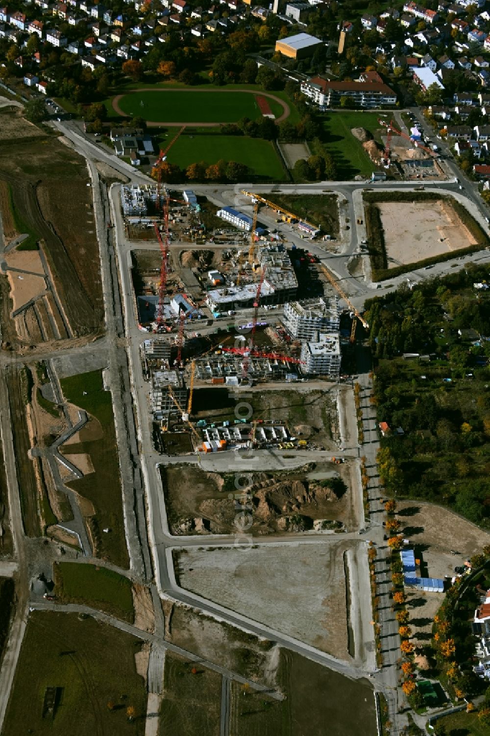 Mannheim from the bird's eye view: Construction site to build a new multi-family residential complex Quartiere Bumerang - Wohnen am Park - FLAIRWOOD und Spinelli 10.5 on street Anna-Sammet-Strasse in the district Kaefertal in Mannheim in the state Baden-Wuerttemberg, Germany