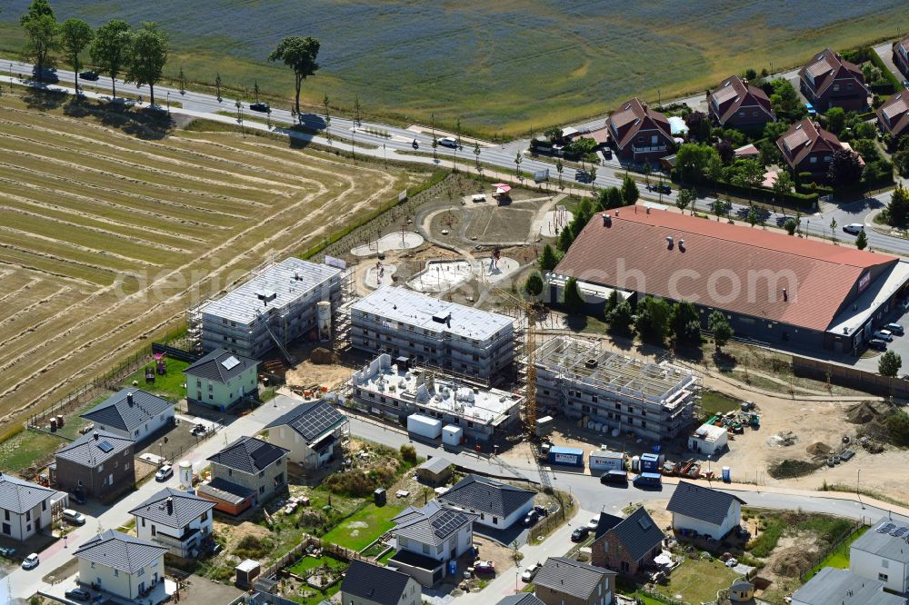 Aerial image Bernau - Construction site to build a new multi-family residential complex Refugium Heideglueck in the district Schoenow in Bernau in the state Brandenburg, Germany