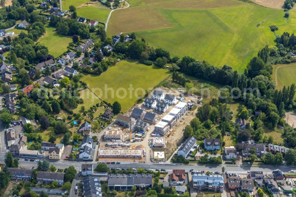 Mülheim an der Ruhr from the bird's eye view: Construction site to build a new multi-family residential complex on Rumbaum - Areal in Muelheim on the Ruhr at Ruhrgebiet in the state North Rhine-Westphalia, Germany