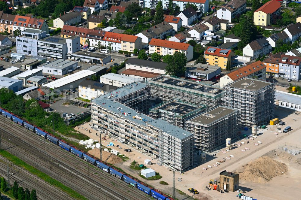 Aerial image Schwetzingen - Construction site to build a new multi-family residential complex Schwetzinger Hoefe on street Scheffelstrasse in the district Rheinau in Schwetzingen in the state Baden-Wuerttemberg, Germany