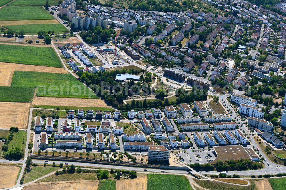 Neckarweihingen from above - Construction site to build a new multi-family residential complex on Strasse Scholppenaecker in Neckarweihingen in the state Baden-Wuerttemberg, Germany