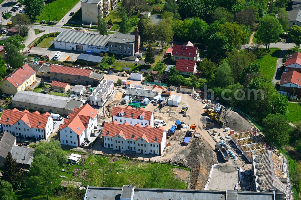 Aerial photograph Berlin - Construction site for the new construction of a multi-family residential complex Wartenberger Anger on Dorfstrasse - Zum Wartenberger Anger in the Wartenberg district of Berlin, Germany