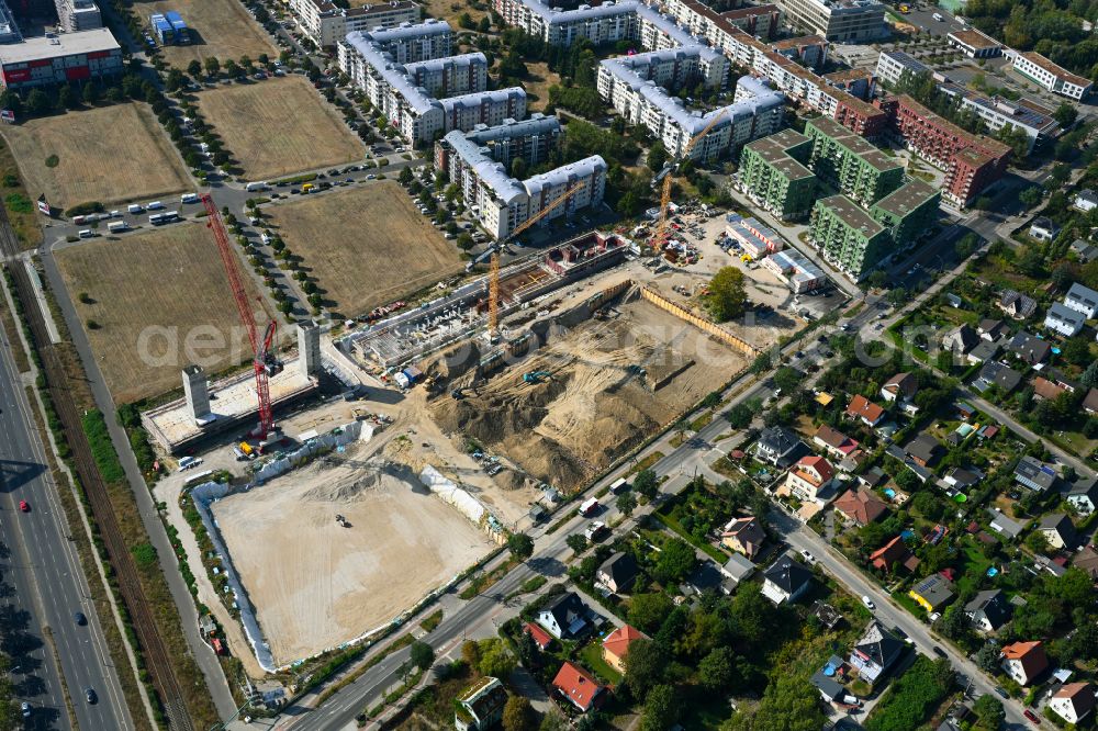 Berlin from above - Construction site to build a new multi-family residential complex Weisse Taube between Ferdinand-Schultze-Strasse, Plauener Strasse and Landsberger Allee in the district Hohenschoenhausen in Berlin, Germany