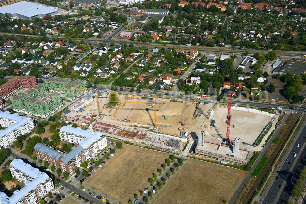 Aerial photograph Berlin - Construction site to build a new multi-family residential complex Weisse Taube between Ferdinand-Schultze-Strasse, Plauener Strasse and Landsberger Allee in the district Hohenschoenhausen in Berlin, Germany