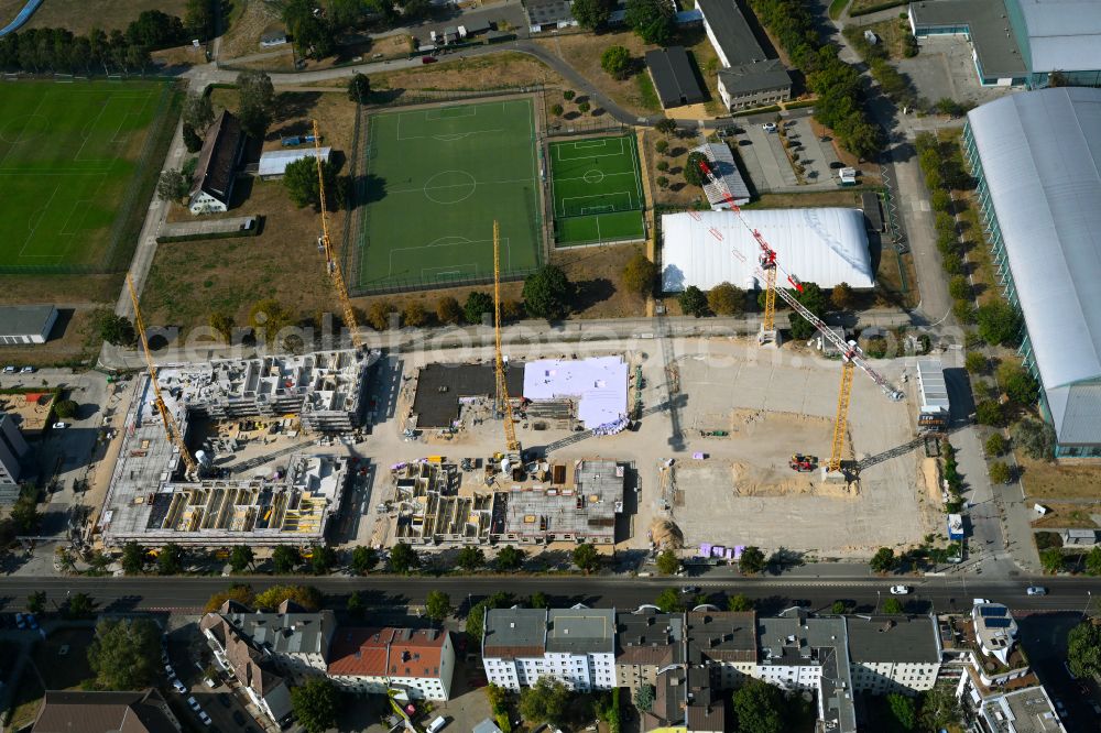 Berlin from above - Construction site to build a new multi-family residential complex Weisse Taube between Ferdinand-Schultze-Strasse, Plauener Strasse and Landsberger Allee in the district Hohenschoenhausen in Berlin, Germany