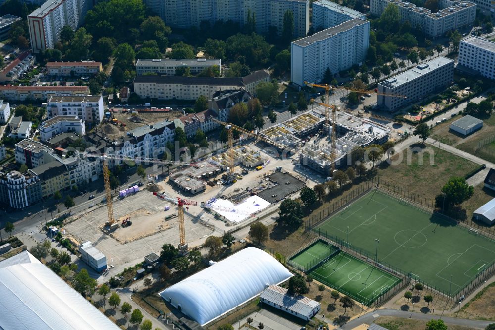 Berlin from above - Construction site to build a new multi-family residential complex Weisse Taube between Ferdinand-Schultze-Strasse, Plauener Strasse and Landsberger Allee in the district Hohenschoenhausen in Berlin, Germany