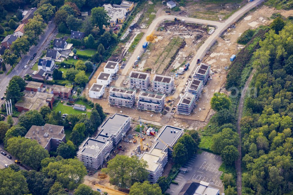 Aerial photograph Homberg - Construction site for the new construction of a multi-family residential complex between Schwarzer Weg, Uettelsheimer Weg and Halener Strasse in the district of Homberg in Duisburg in the Ruhr area in the federal state of North Rhine-Westphalia, Germany