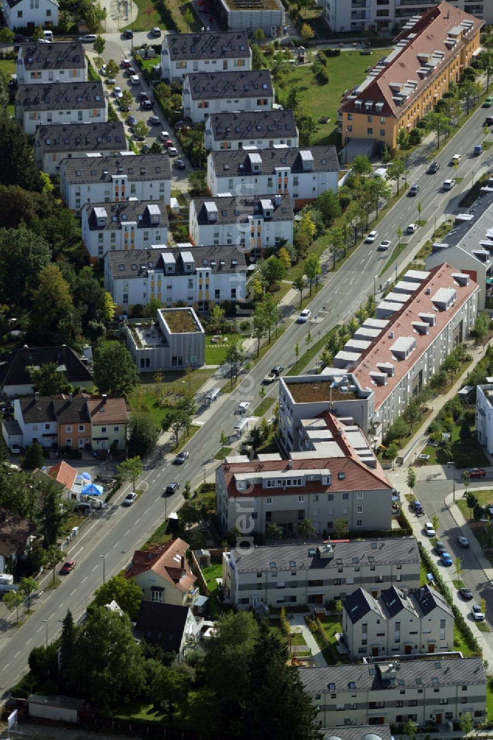 München, Trudering-Riem from the bird's eye view: Construction of a neighborhood meeting and self-help organization at the Bajuwarenstrasse in Munich in Bavaria. Designed by zillerplus architects and urban planners enstand a modern multi - purpose building with the goal of civic engagement in the Quartier activate