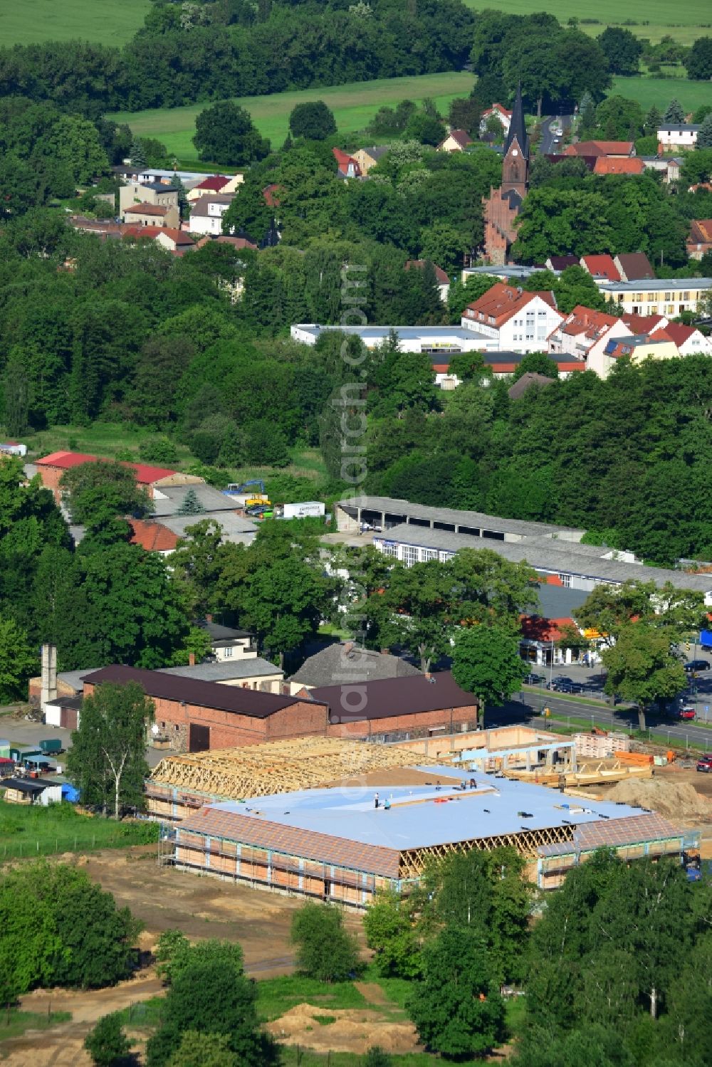 Werneuchen from the bird's eye view: Construction of the local ALDI- shopping center on the B 158 in Werneuchen in Brandenburg