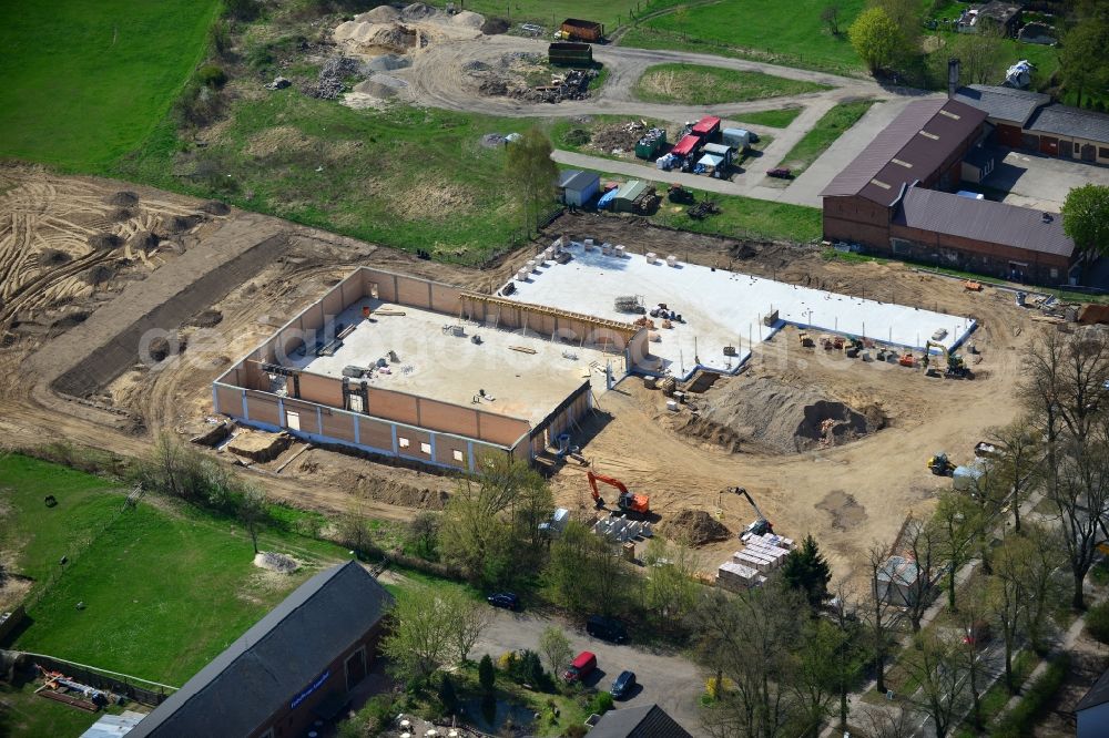 Werneuchen from the bird's eye view: Construction of the local ALDI- shopping center on the B 158 in Werneuchen in Brandenburg