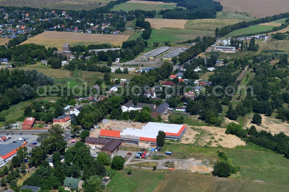 Werneuchen from the bird's eye view: Construction of the local ALDI- shopping center on the B 158 in Werneuchen in Brandenburg