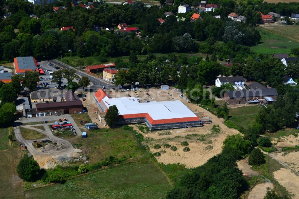 Werneuchen from the bird's eye view: Construction of the local ALDI- shopping center on the B 158 in Werneuchen in Brandenburg