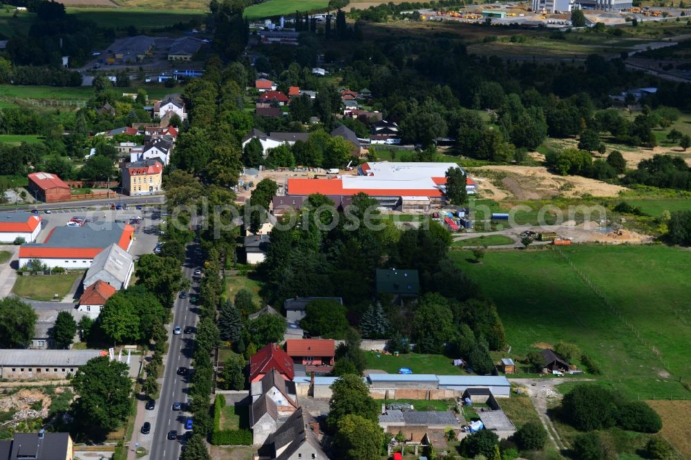 Werneuchen from the bird's eye view: Construction of the local ALDI- shopping center on the B 158 in Werneuchen in Brandenburg