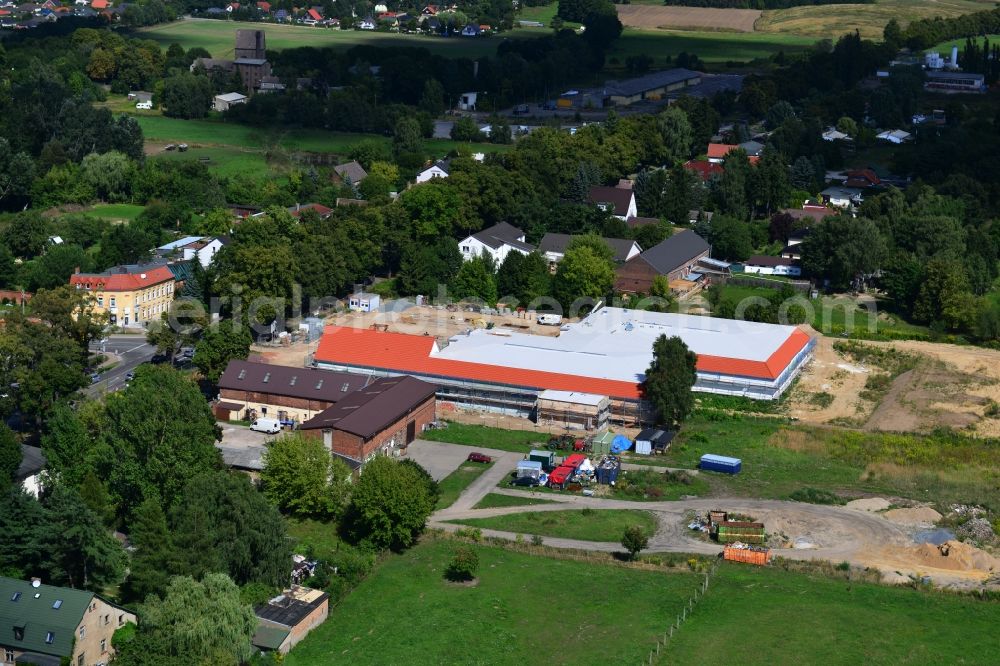 Aerial image Werneuchen - Construction of the local ALDI- shopping center on the B 158 in Werneuchen in Brandenburg