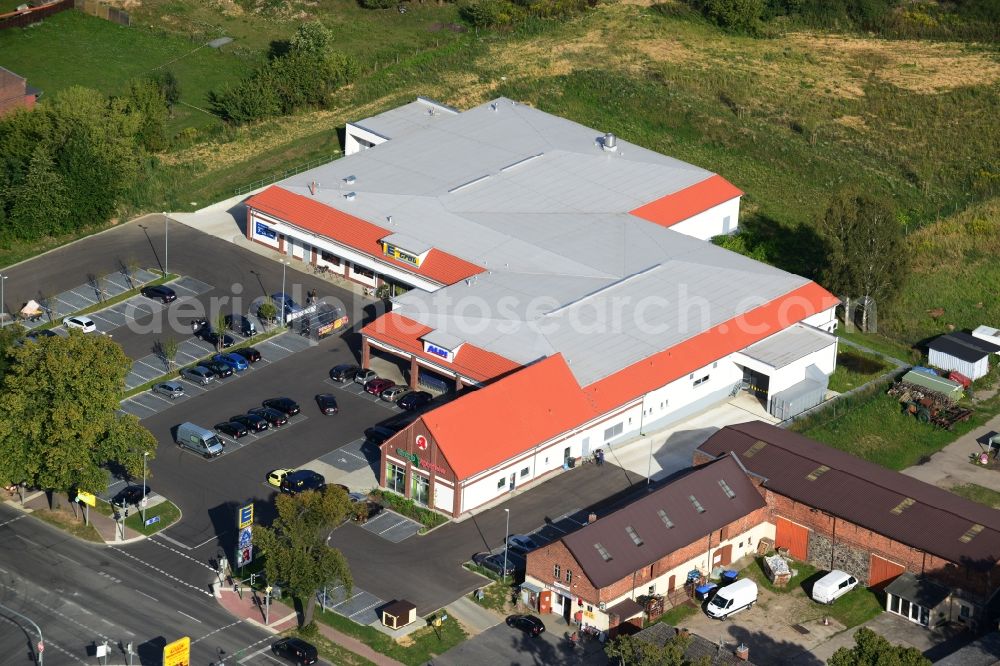 Werneuchen from the bird's eye view: Construction of the local ALDI- shopping center on the B 158 in Werneuchen in Brandenburg