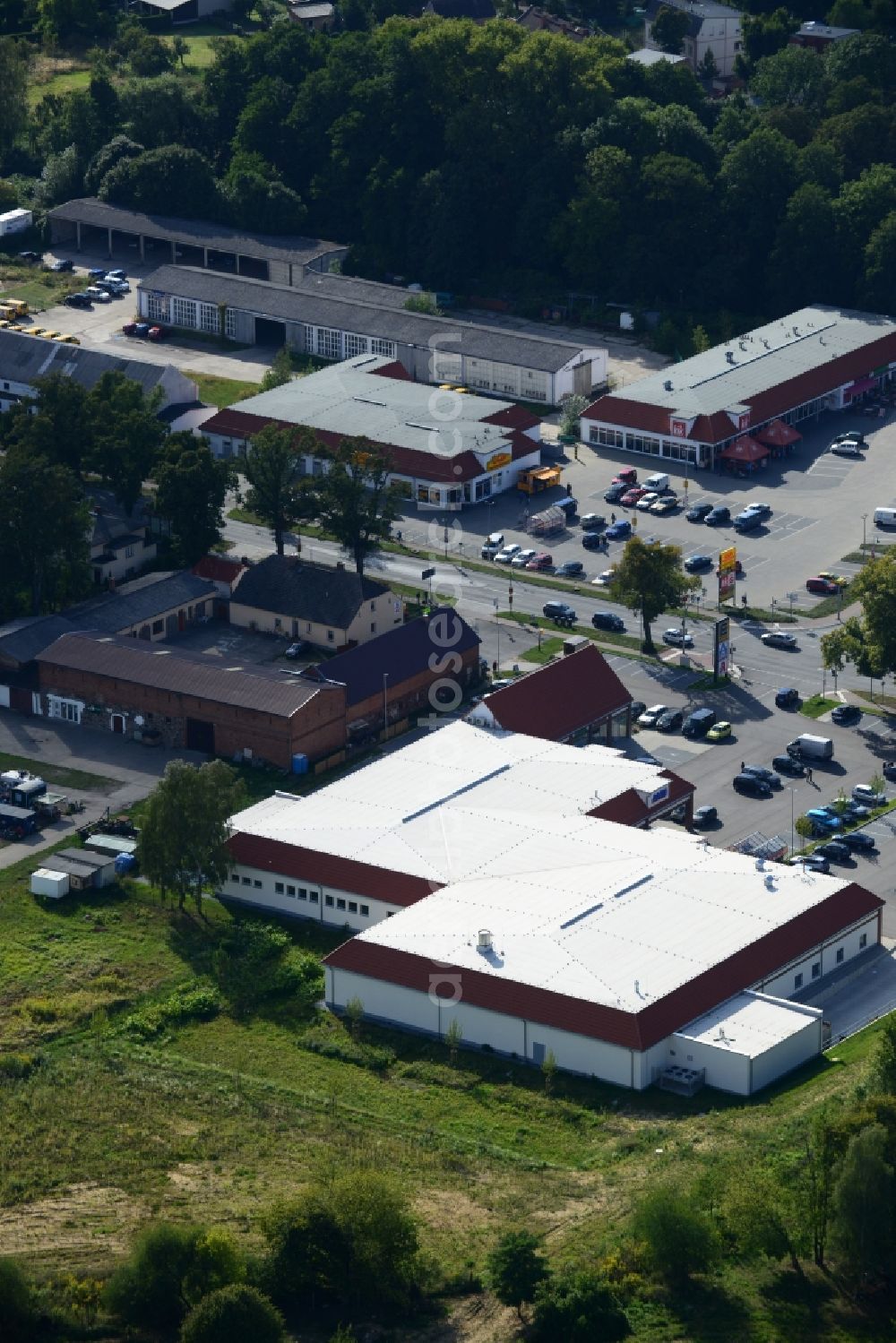 Werneuchen from the bird's eye view: Construction of the local ALDI- shopping center on the B 158 in Werneuchen in Brandenburg