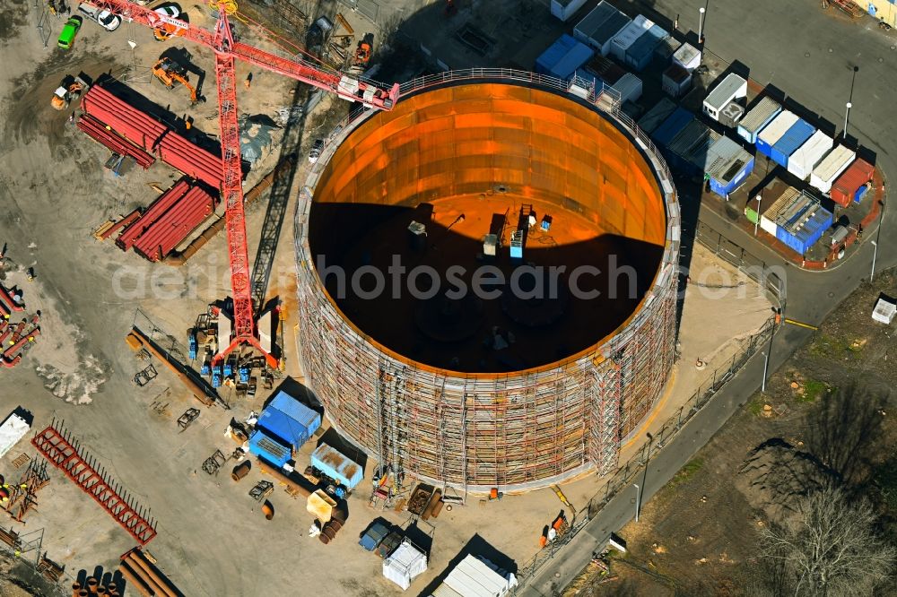 Berlin from the bird's eye view: Construction site for the new construction of a retention basin and water storage tank - heat storage tank on the premises of the Reuter West combined heat and power plant in the district of Siemensstadt in the district Siemensstadt in Berlin, Germany