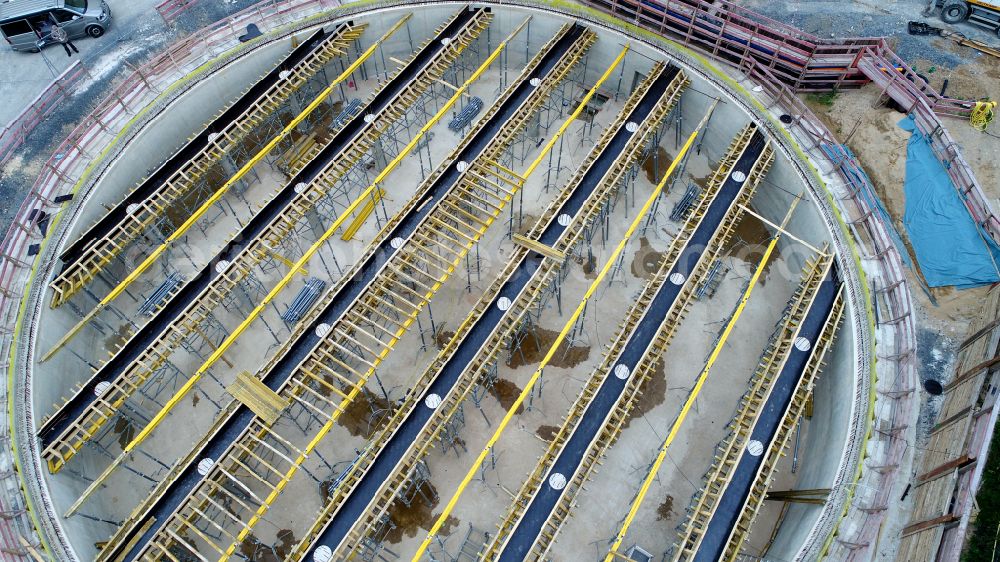 Siegburg from the bird's eye view: Construction of a new rainwater retention basin on street Zeithstrasse in Siegburg in the state North Rhine-Westphalia, Germany