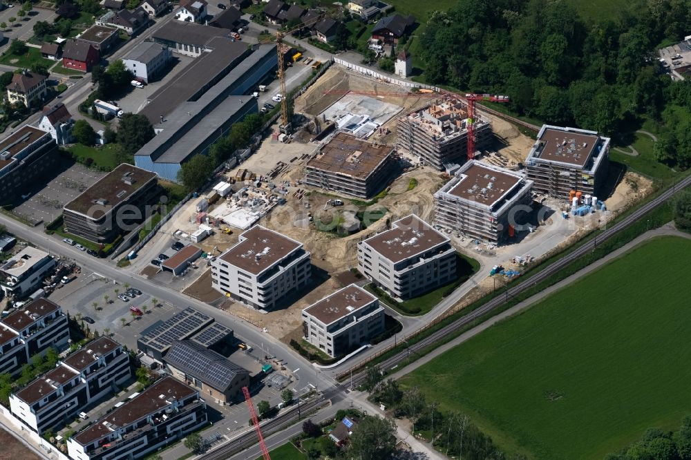 Bottighofen from above - High-rise construction site for a new residential and commercial building Rivage Bottighofen in Bottighofen in the canton Thurgau, Switzerland