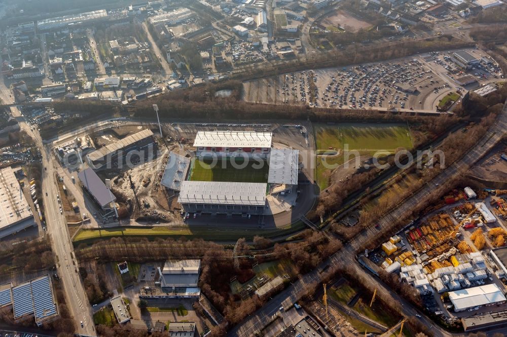 Essen from above - View at the new construction of a soccer stadium in the Hafenstraße in Essen in the federal state North Rhine-Westphalia. The new stadium becomes the home ground of Rot- Weis Essen and will also be used as an event and concert area. The for the construction responsible GVE Grundstücksverwaltung Stadt Essen GmbH has commissioned the Köster GmbH with the operation