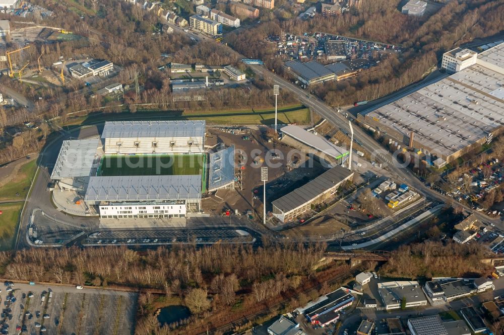 Essen from above - View at the new construction of a soccer stadium in the Hafenstraße in Essen in the federal state North Rhine-Westphalia. The new stadium becomes the home ground of Rot- Weis Essen and will also be used as an event and concert area. The for the construction responsible GVE Grundstücksverwaltung Stadt Essen GmbH has commissioned the Köster GmbH with the operation