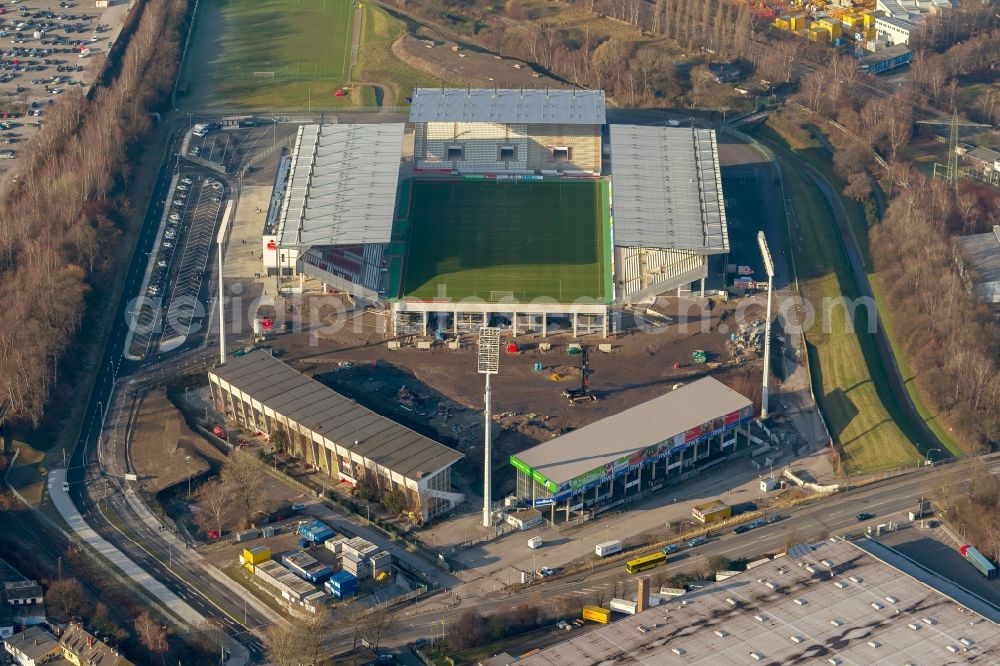 Aerial image Essen - View at the new construction of a soccer stadium in the Hafenstraße in Essen in the federal state North Rhine-Westphalia. The new stadium becomes the home ground of Rot- Weis Essen and will also be used as an event and concert area. The for the construction responsible GVE Grundstücksverwaltung Stadt Essen GmbH has commissioned the Köster GmbH with the operation