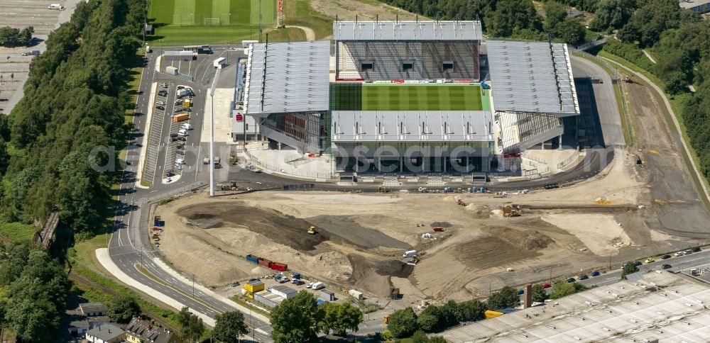 Aerial image Essen - View at the new construction of a soccer stadium in the Hafenstraße in Essen in the federal state North Rhine-Westphalia. The new stadium becomes the home ground of Rot- Weis Essen and will also be used as an event and concert area. The for the construction responsible GVE Grundstücksverwaltung Stadt Essen GmbH has commissioned the Köster GmbH with the operation