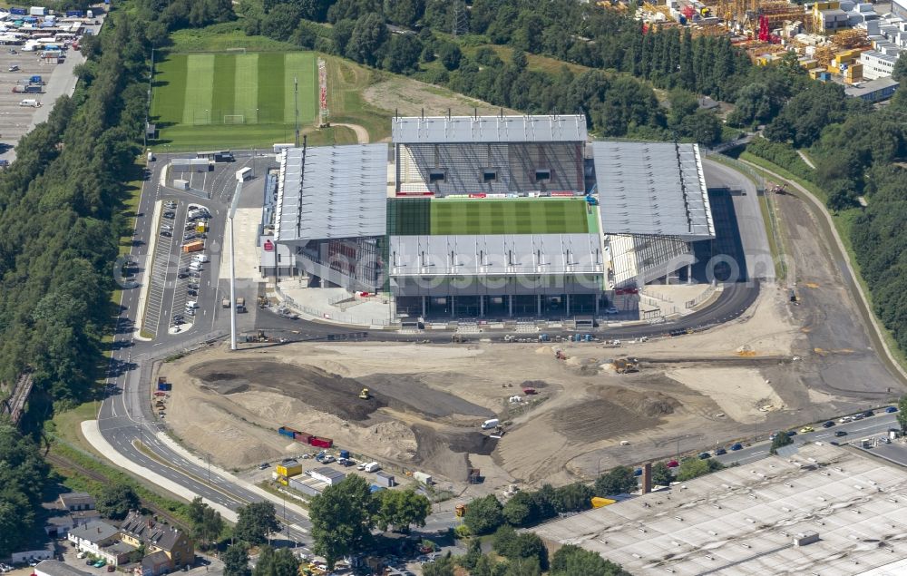 Aerial photograph Essen - View at the new construction of a soccer stadium in the Hafenstraße in Essen in the federal state North Rhine-Westphalia. The new stadium becomes the home ground of Rot- Weis Essen and will also be used as an event and concert area. The for the construction responsible GVE Grundstücksverwaltung Stadt Essen GmbH has commissioned the Köster GmbH with the operation