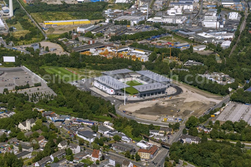 Aerial photograph Essen - View at the new construction of a soccer stadium in the Hafenstraße in Essen in the federal state North Rhine-Westphalia. The new stadium becomes the home ground of Rot- Weis Essen and will also be used as an event and concert area. The for the construction responsible GVE Grundstücksverwaltung Stadt Essen GmbH has commissioned the Köster GmbH with the operation