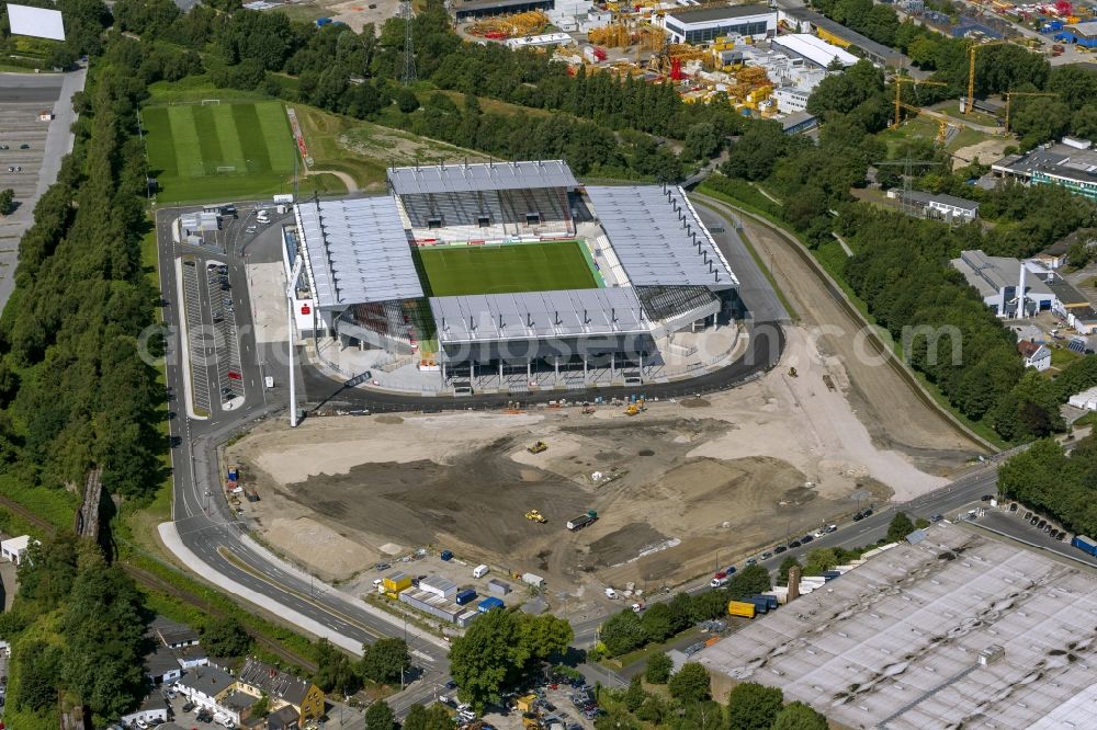 Essen from above - View at the new construction of a soccer stadium in the Hafenstraße in Essen in the federal state North Rhine-Westphalia. The new stadium becomes the home ground of Rot- Weis Essen and will also be used as an event and concert area. The for the construction responsible GVE Grundstücksverwaltung Stadt Essen GmbH has commissioned the Köster GmbH with the operation