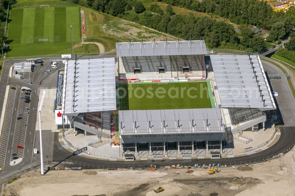 Aerial image Essen - View at the new construction of a soccer stadium in the Hafenstraße in Essen in the federal state North Rhine-Westphalia. The new stadium becomes the home ground of Rot- Weis Essen and will also be used as an event and concert area. The for the construction responsible GVE Grundstücksverwaltung Stadt Essen GmbH has commissioned the Köster GmbH with the operation