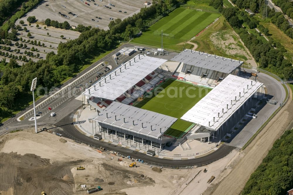 Essen from above - View at the new construction of a soccer stadium in the Hafenstraße in Essen in the federal state North Rhine-Westphalia. The new stadium becomes the home ground of Rot- Weis Essen and will also be used as an event and concert area. The for the construction responsible GVE Grundstücksverwaltung Stadt Essen GmbH has commissioned the Köster GmbH with the operation