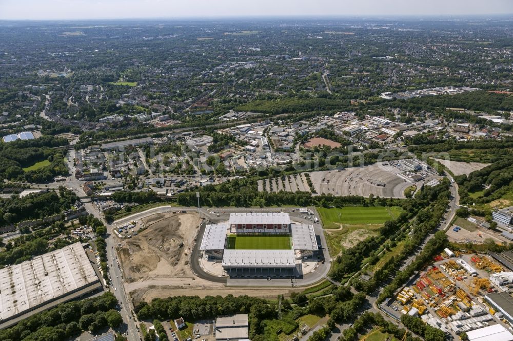 Aerial image Essen - View at the new construction of a soccer stadium in the Hafenstraße in Essen in the federal state North Rhine-Westphalia. The new stadium becomes the home ground of Rot- Weis Essen and will also be used as an event and concert area. The for the construction responsible GVE Grundstücksverwaltung Stadt Essen GmbH has commissioned the Köster GmbH with the operation