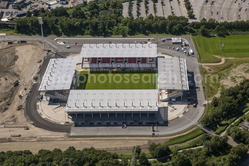 Aerial photograph Essen - View at the new construction of a soccer stadium in the Hafenstraße in Essen in the federal state North Rhine-Westphalia. The new stadium becomes the home ground of Rot- Weis Essen and will also be used as an event and concert area. The for the construction responsible GVE Grundstücksverwaltung Stadt Essen GmbH has commissioned the Köster GmbH with the operation