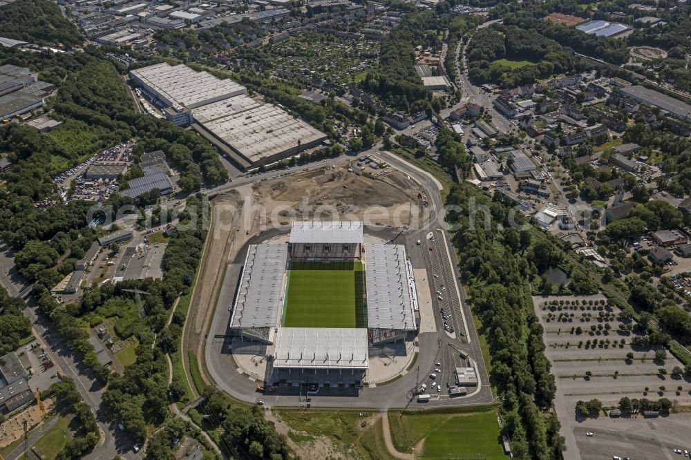 Aerial image Essen - View at the new construction of a soccer stadium in the Hafenstraße in Essen in the federal state North Rhine-Westphalia. The new stadium becomes the home ground of Rot- Weis Essen and will also be used as an event and concert area. The for the construction responsible GVE Grundstücksverwaltung Stadt Essen GmbH has commissioned the Köster GmbH with the operation