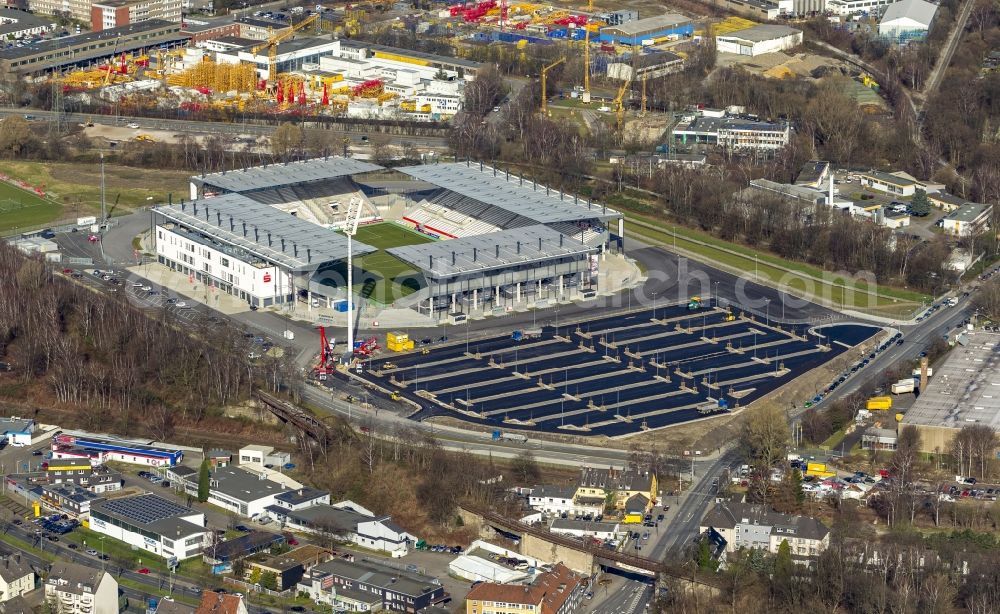 Aerial image Essen - View at the new construction of a soccer stadium in the Hafenstraße in Essen in the federal state North Rhine-Westphalia. The new stadium becomes the home ground of Rot- Weis Essen and will also be used as an event and concert area. The for the construction responsible GVE Grundstücksverwaltung Stadt Essen GmbH has commissioned the Köster GmbH with the operation