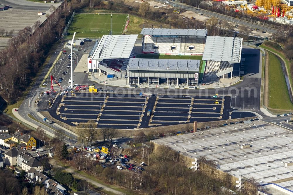 Aerial photograph Essen - View at the new construction of a soccer stadium in the Hafenstraße in Essen in the federal state North Rhine-Westphalia. The new stadium becomes the home ground of Rot- Weis Essen and will also be used as an event and concert area. The for the construction responsible GVE Grundstücksverwaltung Stadt Essen GmbH has commissioned the Köster GmbH with the operation