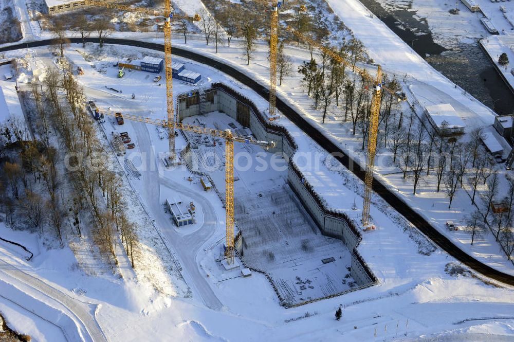 Aerial image Niederfinow - Blick auf die winterlich verschneite Baustelle des Neubaus des Schiffshebewerkes Niederfinow Nord durch die DSD Brückenbau GmbH, die Johann Bunte Bauunternehmung GmbH & Co. KG , Bilfinger Berger Ingenieurbau GmbH und die Siemag GmbH. Look at the new building of the boat lift Niederfinow North Bridge. The new building needed because the old boat lift of 1934 has now reached the end of its life. To maintain the function of the Havel-Oder waterway, it must therefore be replaced by a new building on schedule.