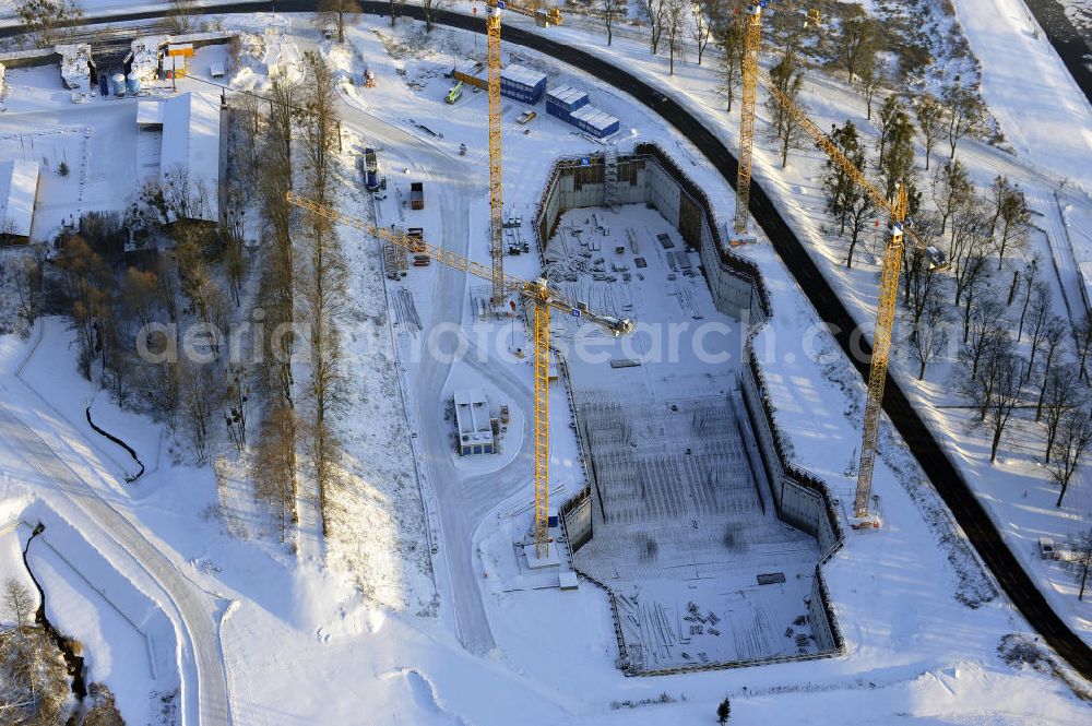 Aerial photograph Niederfinow - Blick auf die winterlich verschneite Baustelle des Neubaus des Schiffshebewerkes Niederfinow Nord durch die DSD Brückenbau GmbH, die Johann Bunte Bauunternehmung GmbH & Co. KG , Bilfinger Berger Ingenieurbau GmbH und die Siemag GmbH. Look at the new building of the boat lift Niederfinow North Bridge. The new building needed because the old boat lift of 1934 has now reached the end of its life. To maintain the function of the Havel-Oder waterway, it must therefore be replaced by a new building on schedule.