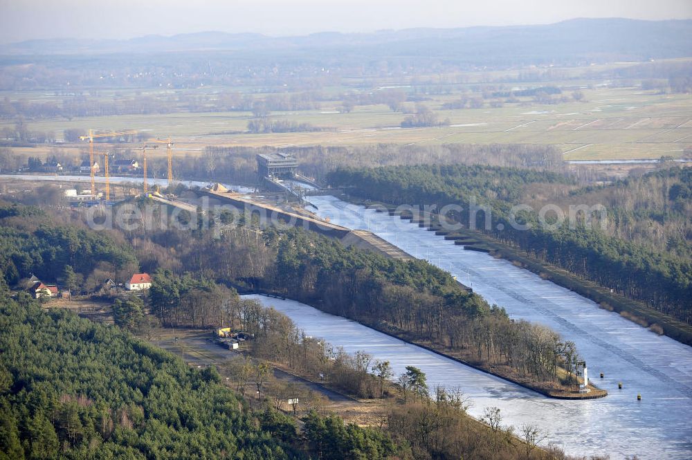 Aerial image Niederfinow - Blick auf die Baustelle des Neubaus des Schiffshebewerkes Niederfinow Nord durch die DSD Brückenbau GmbH, die Johann Bunte Bauunternehmung GmbH & Co. KG , Bilfinger Berger Ingenieurbau GmbH und die Siemag GmbH. Look at the new building of the boat lift Niederfinow North Bridge. The new building needed because the old boat lift of 1934 has now reached the end of its life. To maintain the function of the Havel-Oder waterway, it must therefore be replaced by a new building on schedule.