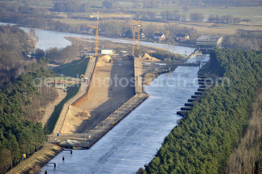 Aerial image Niederfinow - Blick auf die Baustelle des Neubaus des Schiffshebewerkes Niederfinow Nord durch die DSD Brückenbau GmbH, die Johann Bunte Bauunternehmung GmbH & Co. KG , Bilfinger Berger Ingenieurbau GmbH und die Siemag GmbH. Look at the new building of the boat lift Niederfinow North Bridge. The new building needed because the old boat lift of 1934 has now reached the end of its life. To maintain the function of the Havel-Oder waterway, it must therefore be replaced by a new building on schedule.