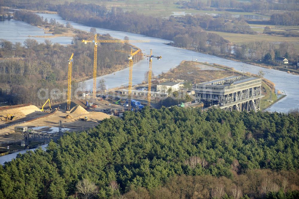 Niederfinow from the bird's eye view: Blick auf die Baustelle des Neubaus des Schiffshebewerkes Niederfinow Nord durch die DSD Brückenbau GmbH, die Johann Bunte Bauunternehmung GmbH & Co. KG , Bilfinger Berger Ingenieurbau GmbH und die Siemag GmbH. Look at the new building of the boat lift Niederfinow North Bridge. The new building needed because the old boat lift of 1934 has now reached the end of its life. To maintain the function of the Havel-Oder waterway, it must therefore be replaced by a new building on schedule.