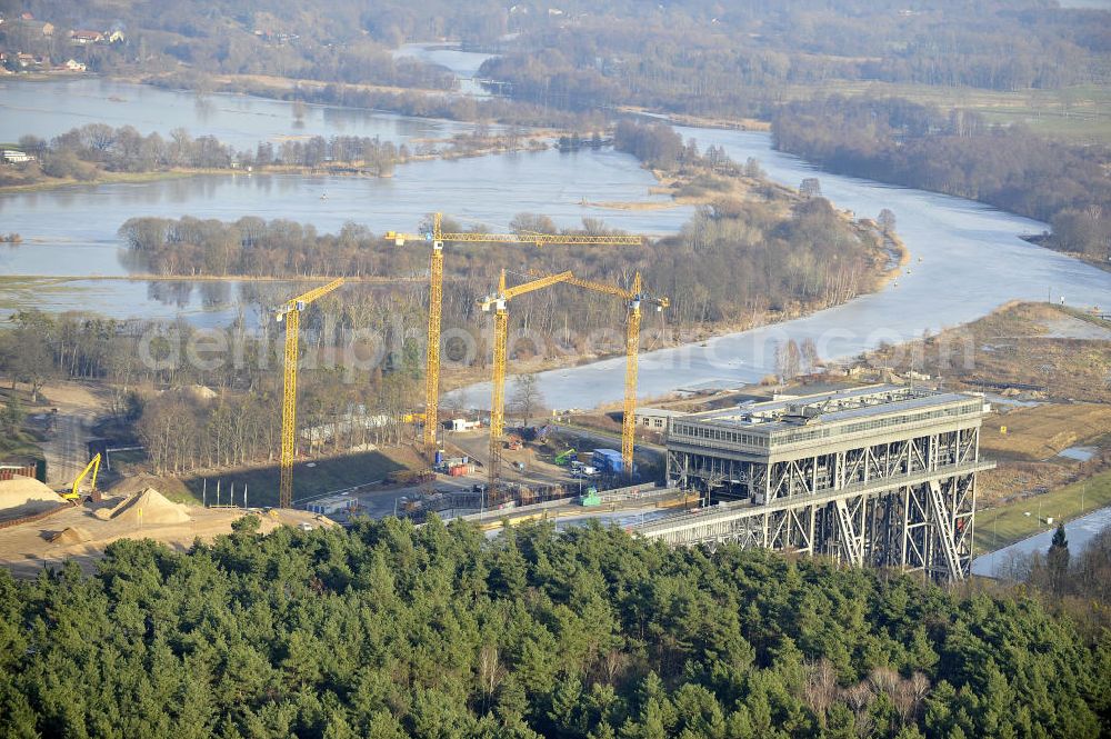 Aerial image Niederfinow - Blick auf die Baustelle des Neubaus des Schiffshebewerkes Niederfinow Nord durch die DSD Brückenbau GmbH, die Johann Bunte Bauunternehmung GmbH & Co. KG , Bilfinger Berger Ingenieurbau GmbH und die Siemag GmbH. Look at the new building of the boat lift Niederfinow North Bridge. The new building needed because the old boat lift of 1934 has now reached the end of its life. To maintain the function of the Havel-Oder waterway, it must therefore be replaced by a new building on schedule.